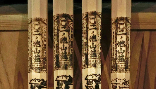 Branding iron on wooden stick